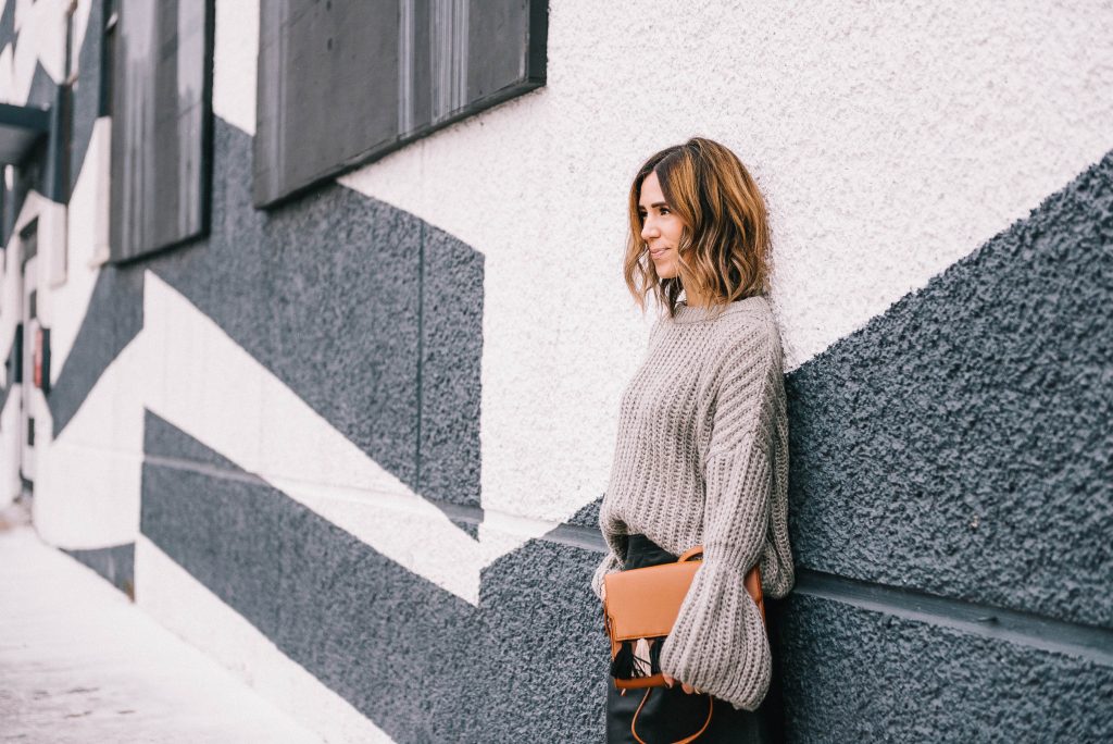 Blogger Mary Krosnjar wearing Grey Bell Sleeve Oversized Sweater