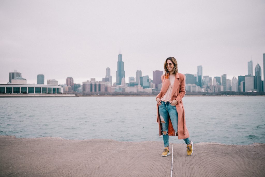 Blogger Mary Krosnjar wearing Lavish Alice Pink Coat and Blank NYC distressed denim