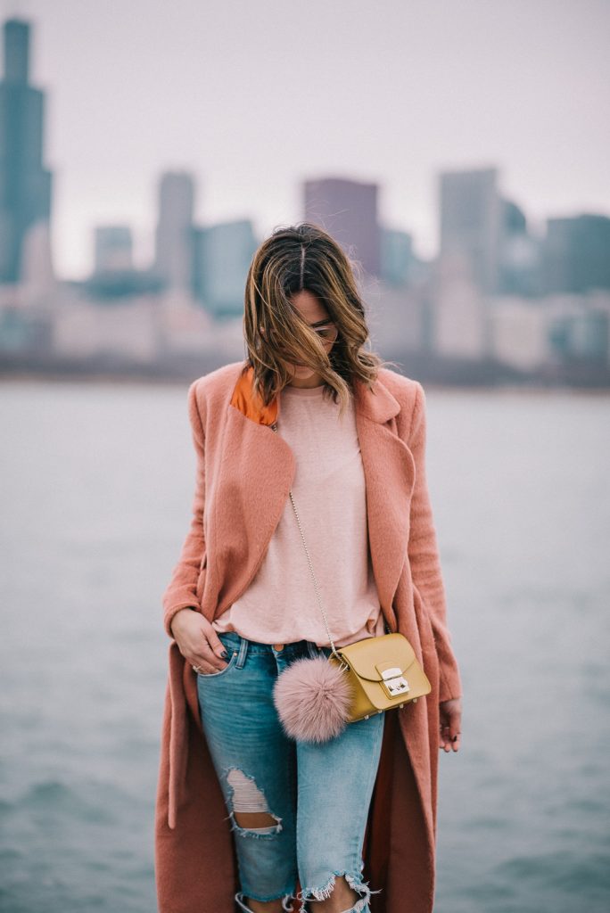 Blogger Mary Krosnjar wearing pink Who What Wear tee and Furla Mini Crossbody bag