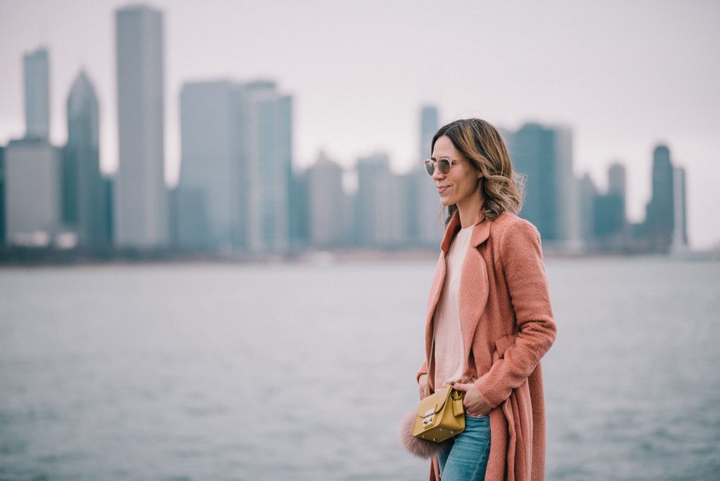 Blogger Mary Krosnjar wear pink coat and pink tee