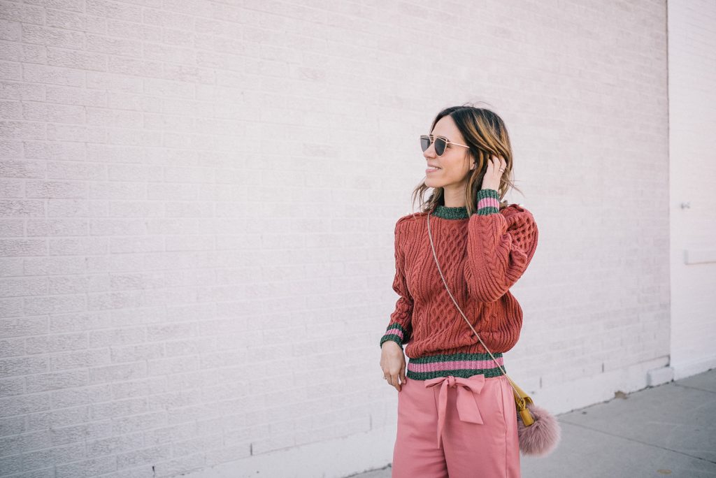 Blogger Mary Krosnjar wearing Storets Lace Sweatshirt and Pink cropped pants with Valentinos 