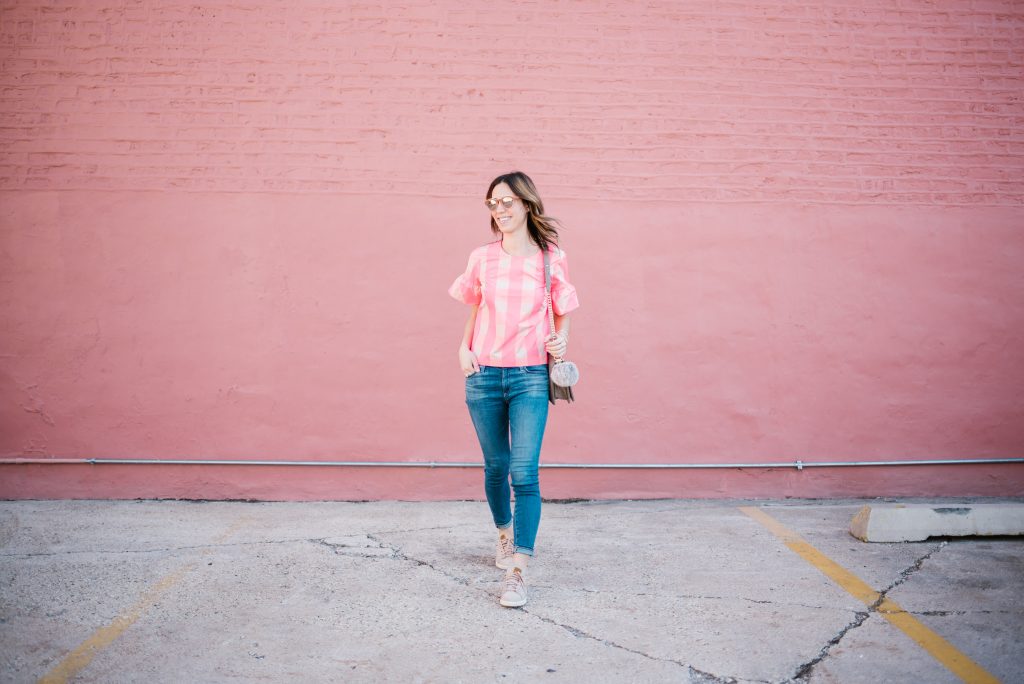 Blogger Mary Krosnjar wearing neon buffalo check JCrew top and AG Jeans