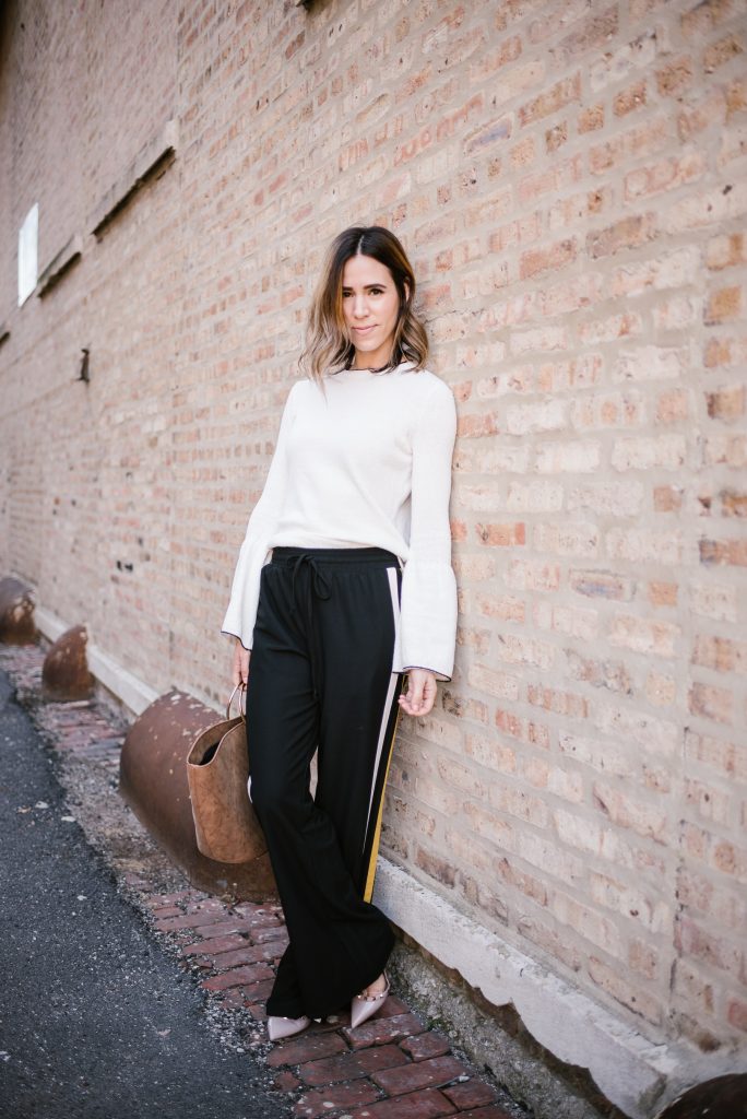 Blogger Mary Krosnjar wearing Who What Wear Target Collection, Track Pants and Valentino Pumps