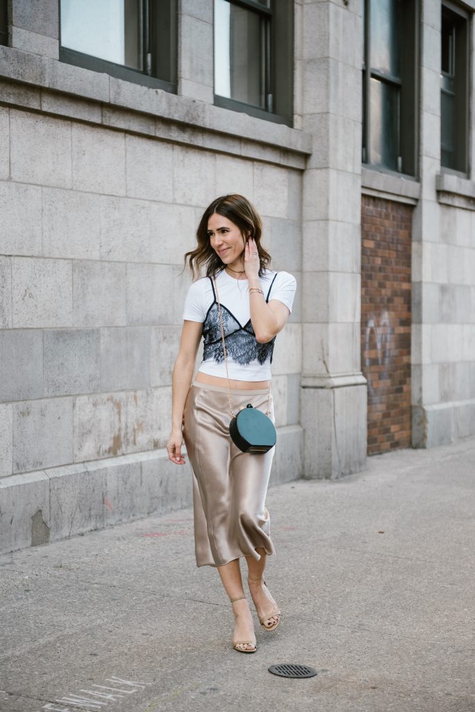 Blogger Mary Krosnjar wearing lace overlay cami top and Vince Silk Skirt
