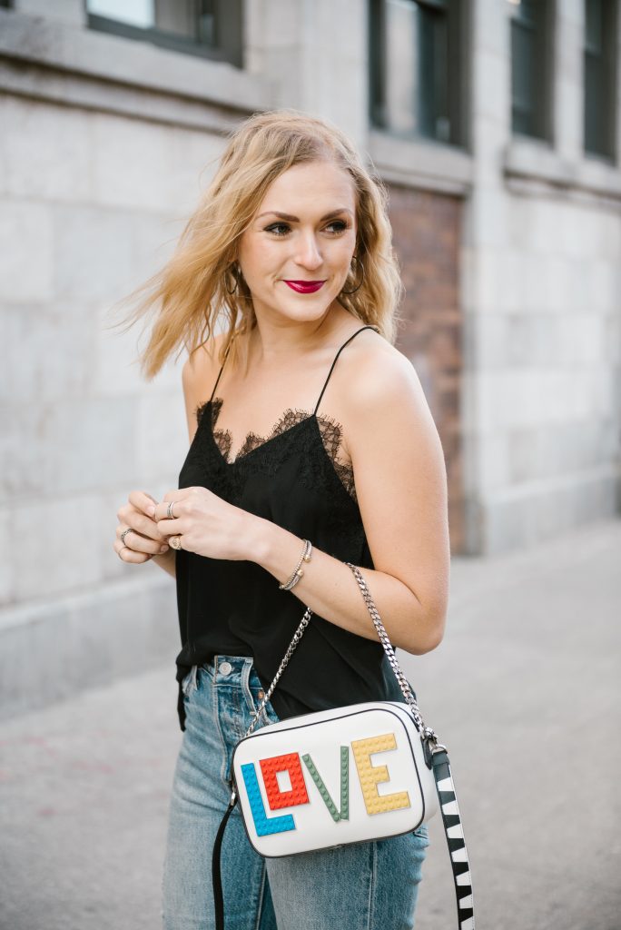 Blogger Ali Stone wearing NYC Cami and Exclusive Roy Black Widow Love Bag