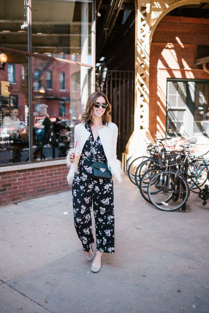 Blogger Mary Krosnjar wearing white blazer with faux fur trim and La Colombe Chicago 