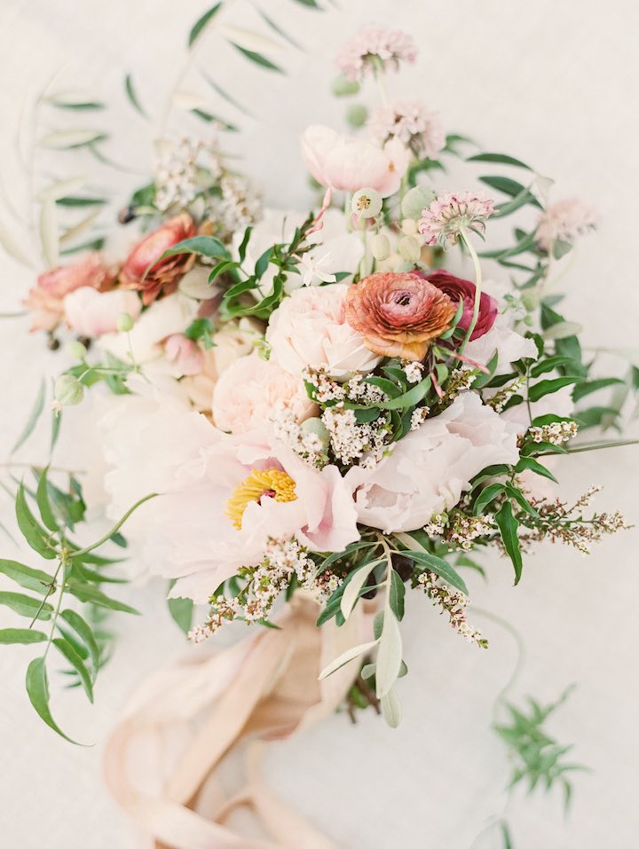 Neutral wedding floral arrangement and Wedding Guest Etiquette