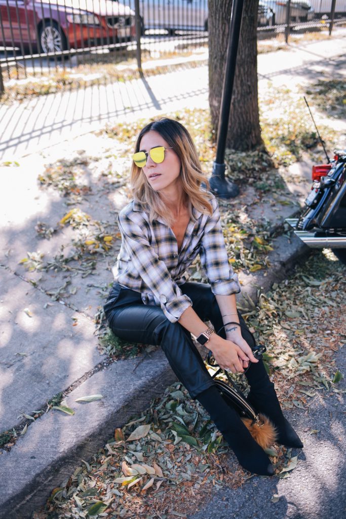 Blogger Mary Krosnjar wearing Purdue Boilermaker plaid flannel and H&M faux leather pants