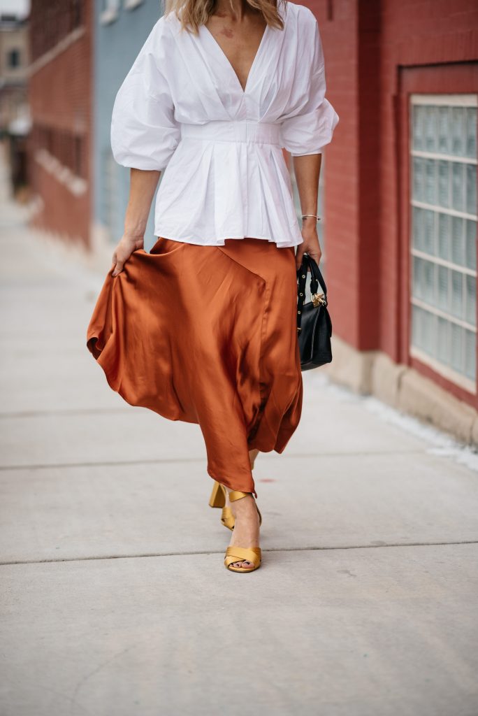 Blogger Mary Krosnjar styling Rust Satin Skirt with Ann Taylor Satin Sandals
