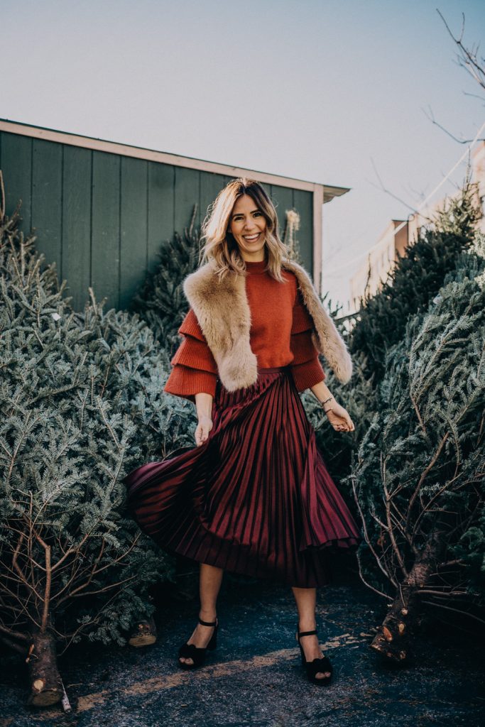 Blogger Mary Krosnjar wearing Polished Pleated Skirt and Cinnamon Tiered Sleeve Sweater