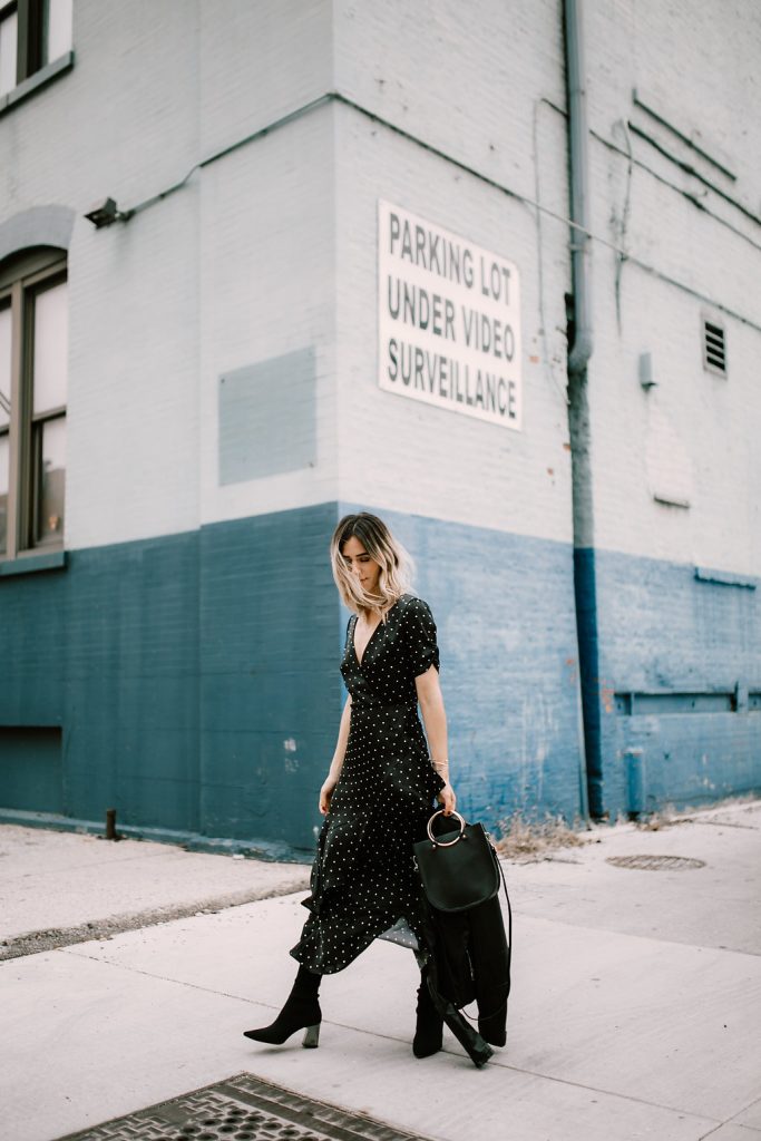 Blogger Mary Krosnjar wearing Forever 21 Polka Dot Ruffle Dress and Blank NYC Moto Jacket