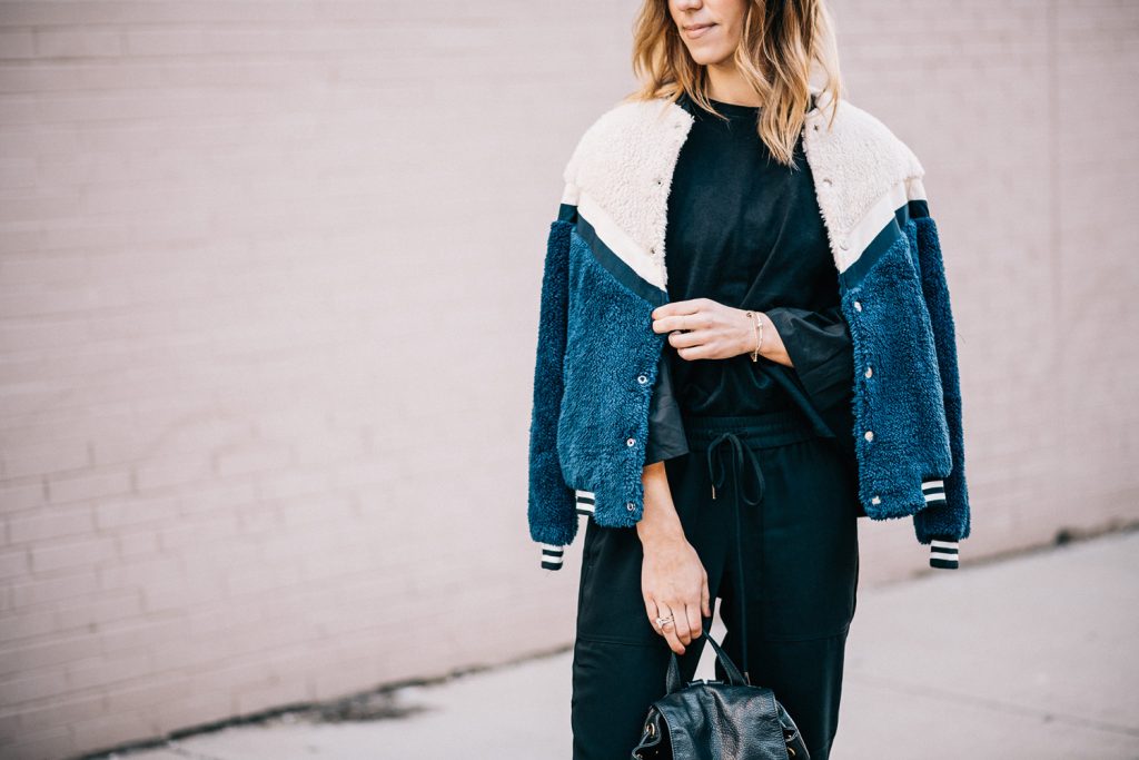 Blogger Mary Krosnjar wearing Weekend Casual and Travel Look with Teddy Bomber Jacket