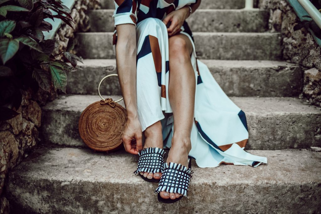 Blogger Mary Krosnjar wearing Geometric Print Split Maxi Dress and Woven H&M Mules
