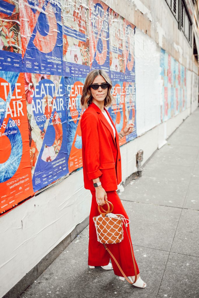 Blogger Mary Krosnjar wearing Topshop Slouch Suit Trousers and Mango Net Bag