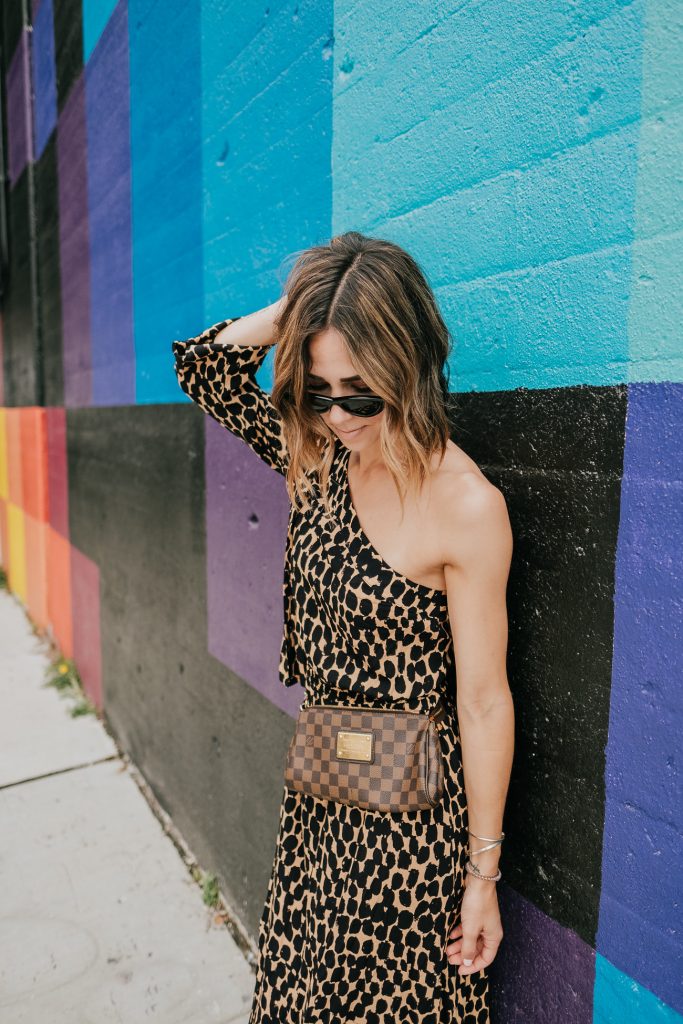 Blogger Mary Krosnjar wearing Who What Wear Leopard Print Long Sleeve One Shoulder Midi Dress