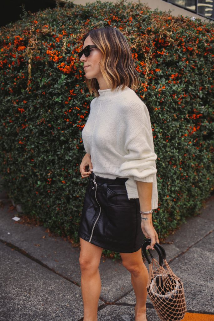 Blogger Mary Krosnjar wearing Topshop Faux Leather skirt and Balloon Sleeve Sweater