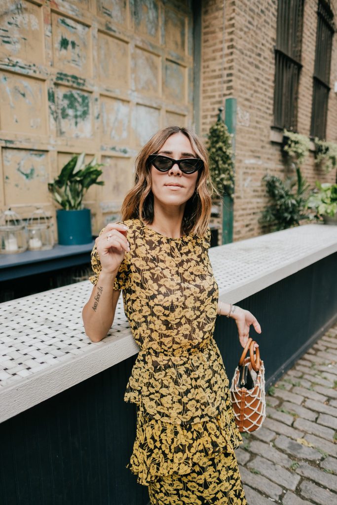 Blogger Mary Krosnjar wearing Who What Wear Floral Top and Mango Bag