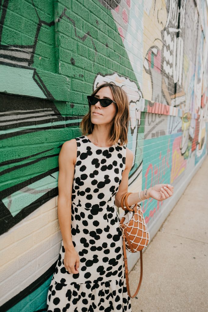 Blogger Mary Krosnjar wearing Polka Dot Sleeveless Ruffle Dress and Cat Eye Sunglasses