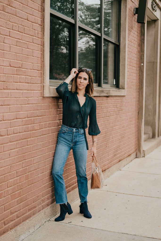 Blogger Mary Krosnjar wearing Wedgie Icon Denim and Clear Bag