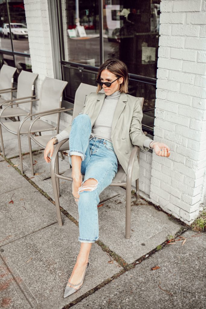 Blogger Mary Krosnjar wearing Sage Faux Leather Blazer with Dad Jeans for Fall Look