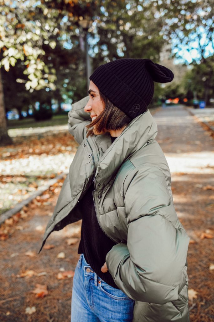 Mary Krosnjar wearing The Drop Women's Julie Ribbed Beanie Hat and The Drop Women's Dani Recycled Poly Puffer Jacket
