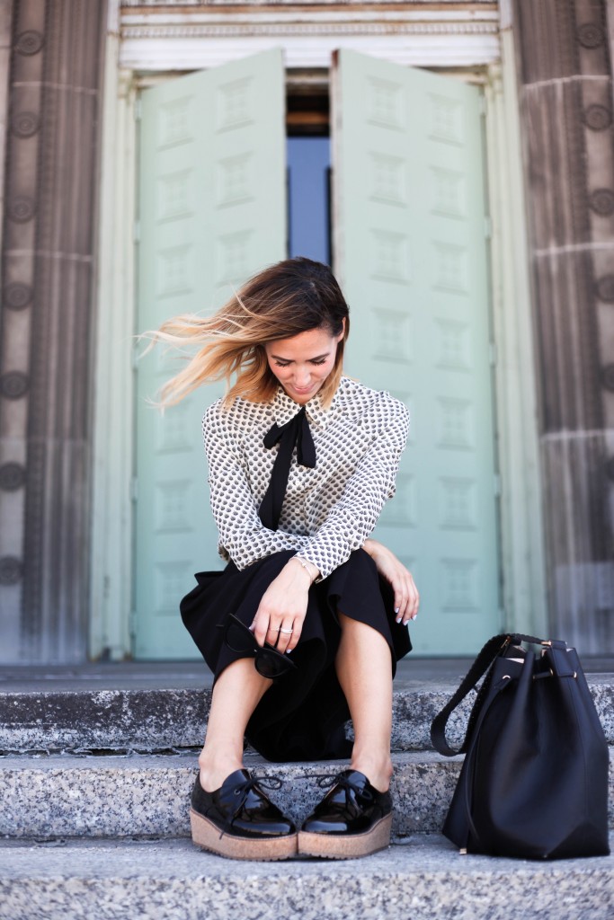 Wayf Tie Neck Button Front Blouse, 424 Fifth Culottes, Black Cat Eye Sunglasses, Black Leather Bucket Bag, Shellys Black Patent Cork Platform Shoes