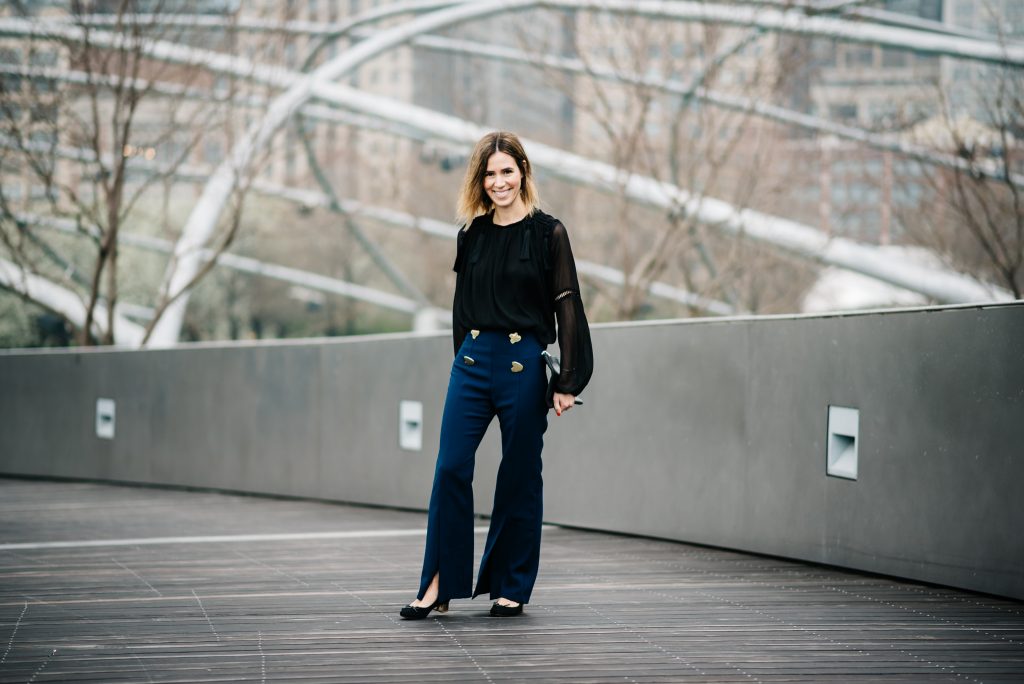 Storets Goldie Slash Out Pants, Charlotte Olympia Kitty Flats, H&M Tassel Blouse, Monogrammed Leather Pouch, Chicago Blogger, Sports and Fashion Blogger