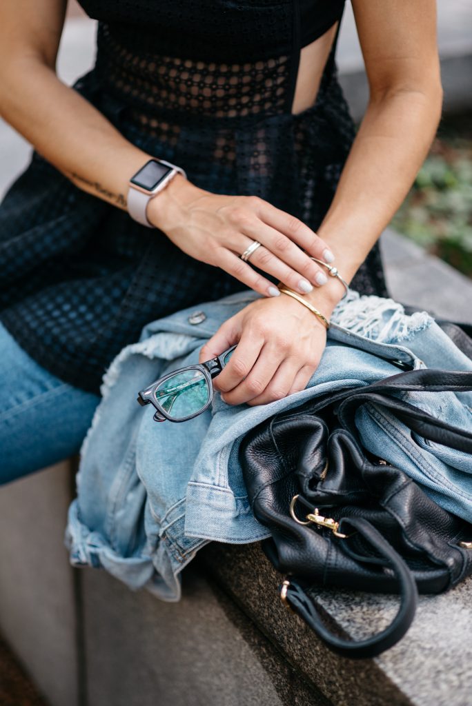 Black Sleeveless Eyelet Peplum Blouse, Raw Hem Straight Leg Jeans, Valentino Rockstud Pumps, Chicago Fashion Blogger