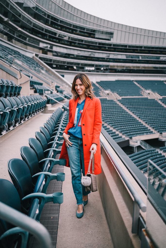 Blogger Mary Krosnjar wearing red Jcrew wool coat and vintage New England Patriots jersey