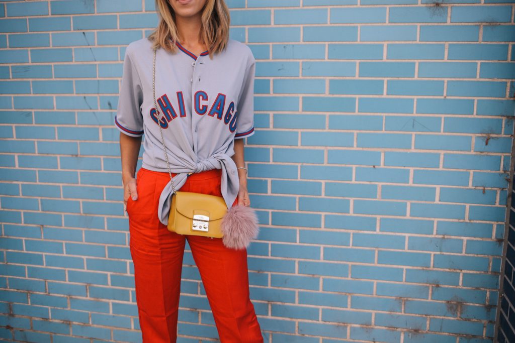 Blogger Mary Krosnjar wearing Chicago Cubs Jersey and Red H&M pull on pants