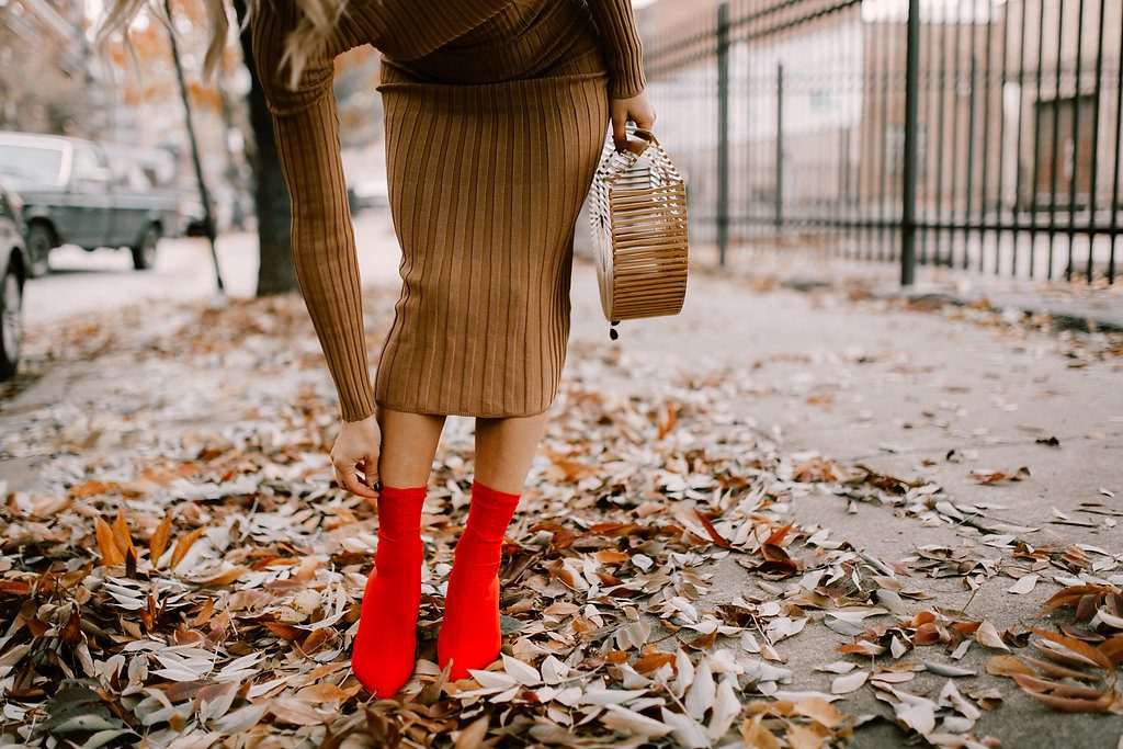 Blogger Mary Krosnjar wearing Red Ankle Booties, Tan Knit Dress and Bamboo Bag