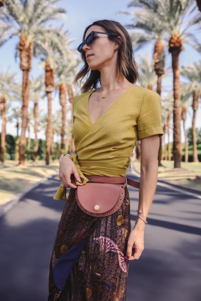 Blogger Mary Krosnjar wearing J.O.A. wrapped crop top and See by Chloe Convertible Bag