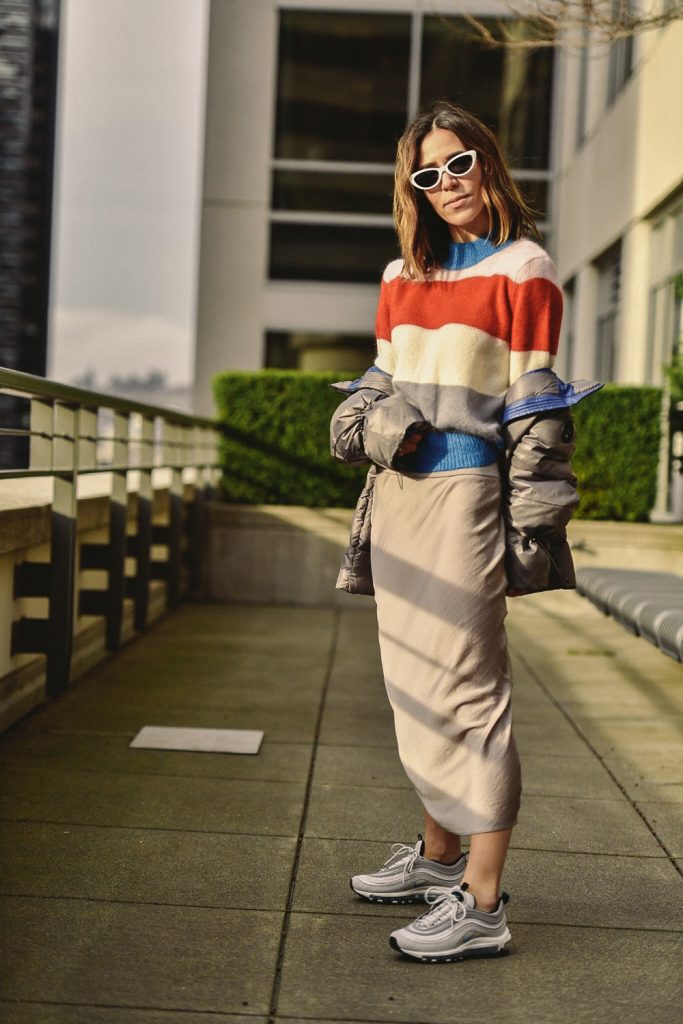 Blogger Sportsanista wearing Free People Normani Bias Cut Satin Skirt and Nordstrom Signature Striped Sweater
