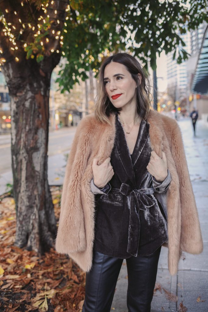 Blogger Sportsanista wearing Faux Fur Coat and Stila Lipstick Besos