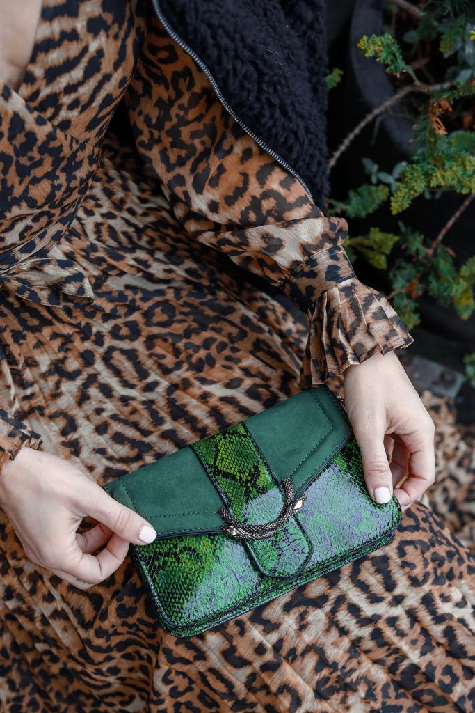 Blogger Sportsanista wearing Topshop Sela Crossbody Bag and H&M Leopard Print Dress