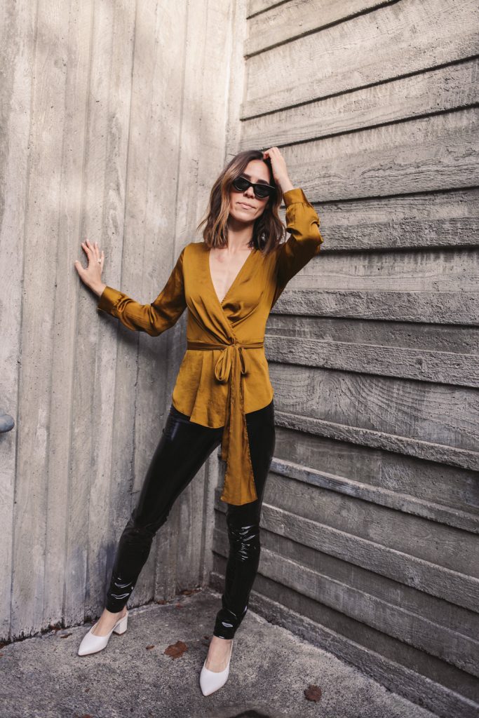 Seattle Fashion Blogger wearing wrap top and patent leather treggings