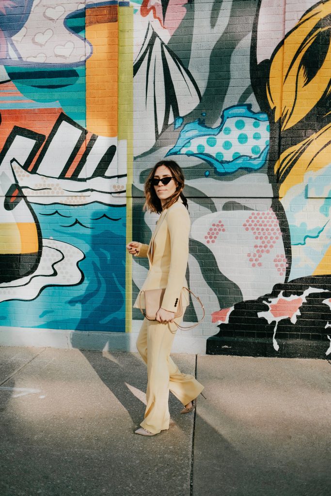 Seattle Fashion Blogger Sportsanista wearing H&M Light Yellow Dress Pants and Valentino Rockstud Pumps