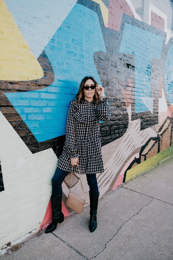 Seattle Fashion Blogger sharing how to style a dress over jeans and western style boots