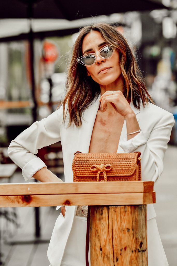 Seattle Fashion Blogger Sportsanista wearing $11 silver mirrored sunglasses and Rattan Woven Crossbody Bag
