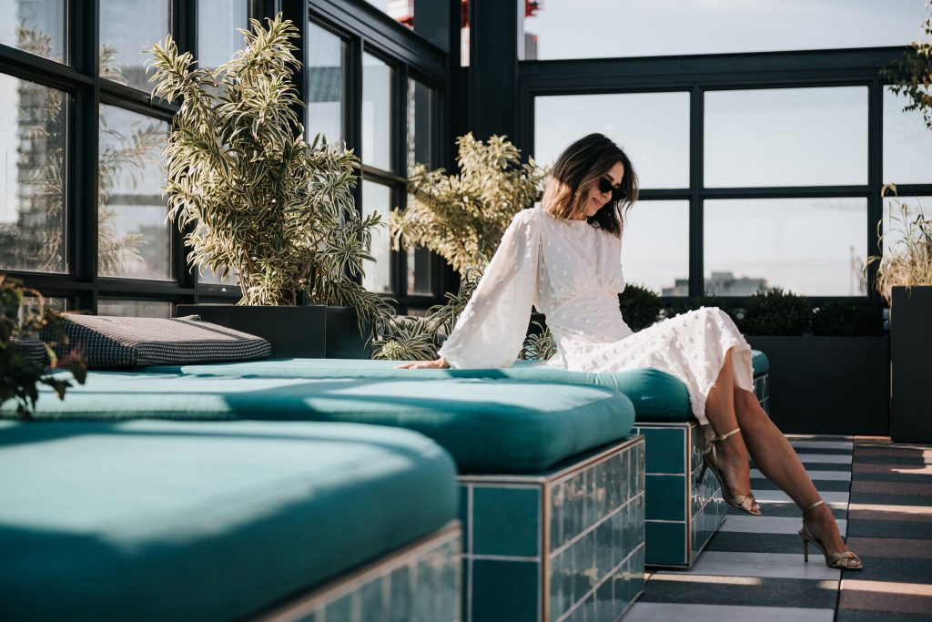 Seattle Blogger Sportsanista sharing favorite Chicago Rooftop and wearing Cotton Candy Sheer Maxi Dress in Cream