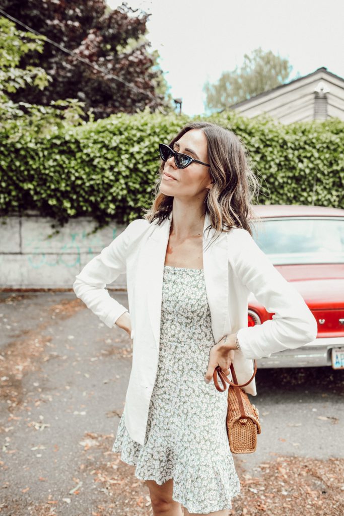 Seattle Fashion Blogger Sportsanista wearing white oversized blazed with floral dress for summer