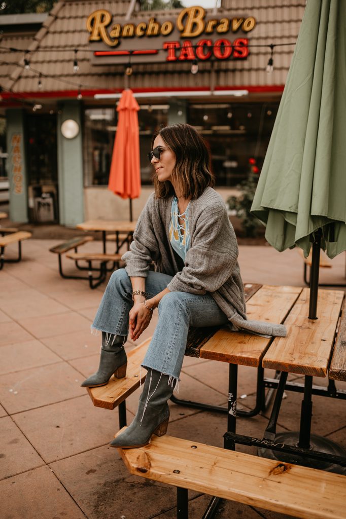 Blogger Sportsanista wearing Topshop Long Cardigan, Levi's Ribcage Kick Crop Denim and Sam Edelman Suede Slouchy Boots