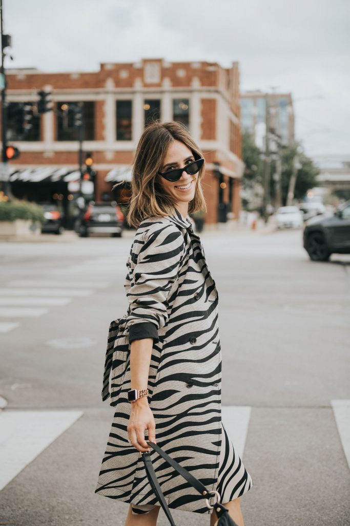 Fashion Blogger Sportsanista wearing Zebra Print Trench Coat from Ann Taylor for workwear inspiration