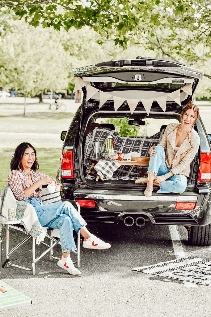 Sportsanista sharing how to build a tailgate party from your car for game day weekends