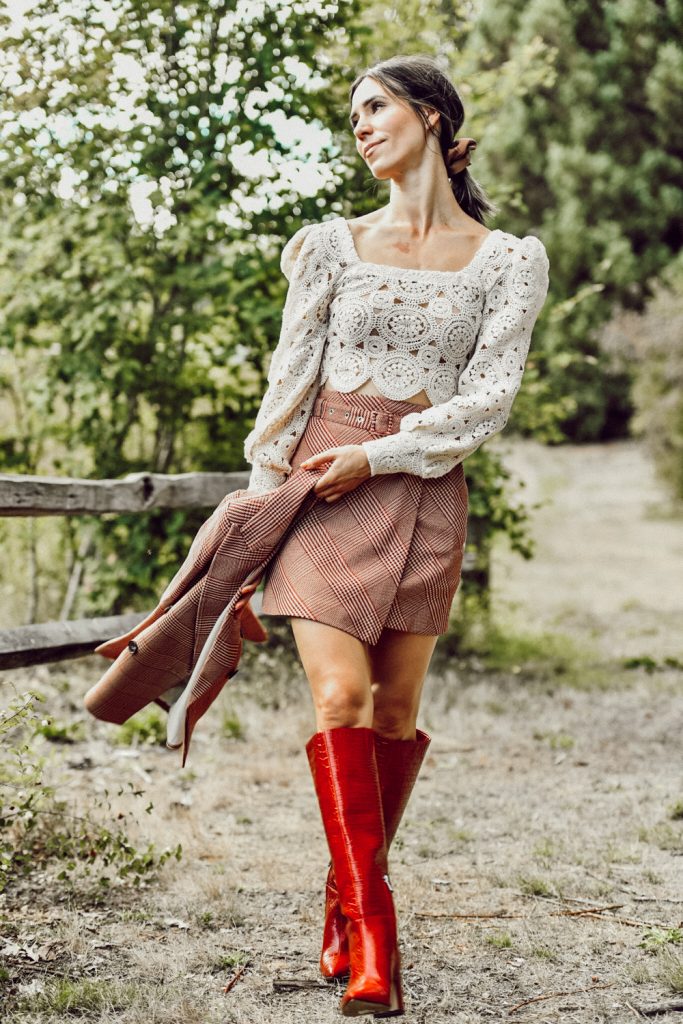 Seattle Fashion Blogger Sportsanista wearing Zara Lace Crop Top, H&M Plaid Skirt with Belt and Red Boots for Fall 