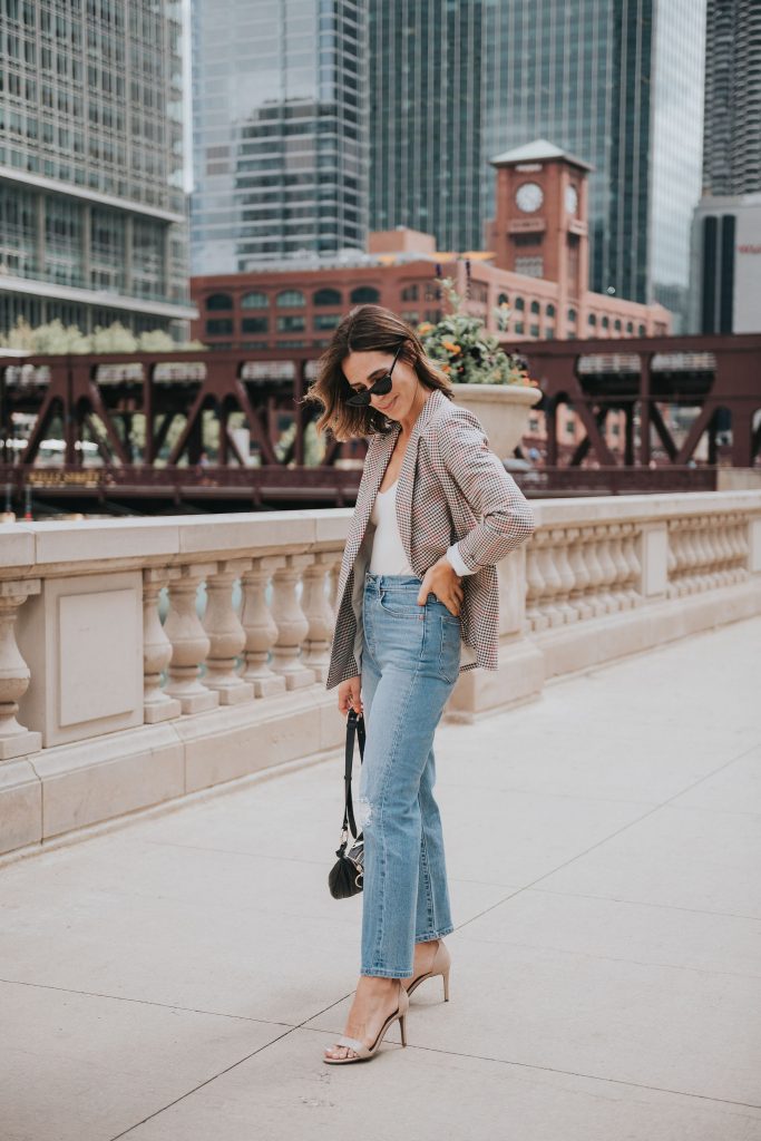 Seattle Blogger Sportsanista sharing how to style a fall plaid blazer with a bodysuit and high waisted denim 