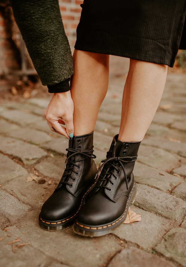 Blogger Mary Krosnjar sharing how to style Dr. Marten boots with a dress